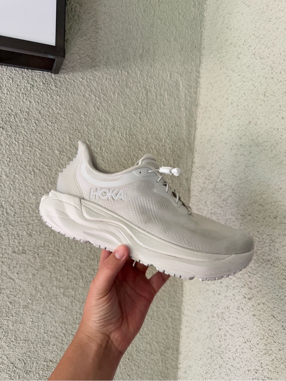 HOKA white running shoes